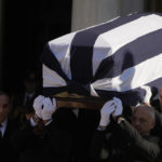 
              The coffin of former king of Greece Constantine II leave the Metropolitan cathedral during his funeral in Athens, Monday, Jan. 16, 2023. Constantine died in a hospital late Tuesday at the age of 82 as Greece's monarchy was definitively abolished in a referendum in December 1974. (AP Photo/Petros Giannakouris)
            