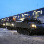 
              Britain's armoured vehicles prepare to move at the Tapa Military Camp, in Estonia, Thursday, Jan. 19, 2023. Britain's Defense Secretary Ben Wallace said his country would send at least three batteries of AS-90 artillery, armored vehicles, thousands of rounds of ammunition and 600 Brimstone missiles, as well as the squadron of Challenger 2 tanks. (AP Photo/Pavel Golovkin)
            