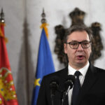
              Serbian President Aleksandar Vucic speaks during a press conference after meeting with European Union envoy Miroslav Lajcak, in Belgrade, Serbia, Friday, Jan. 20, 2023. Western envoys on Friday were visiting Kosovo and Serbia as part of their ongoing efforts to defuse tensions and help secure a reconciliation agreement between the two. (AP Photo/Darko Vojinovic)
            