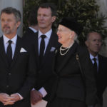 
              Denmark's Crown Prince Frederik, left, and Queen Margrethe II of Denmark stand outside of the Metropolitan Cathedral during the funeral of former king of Greece Constantine II in Athens, Monday, Jan. 16, 2023. Constantine died in a hospital late Tuesday at the age of 82 as Greece's monarchy was definitively abolished in a referendum in December 1974. (AP Photo/Petros Giannakouris)
            