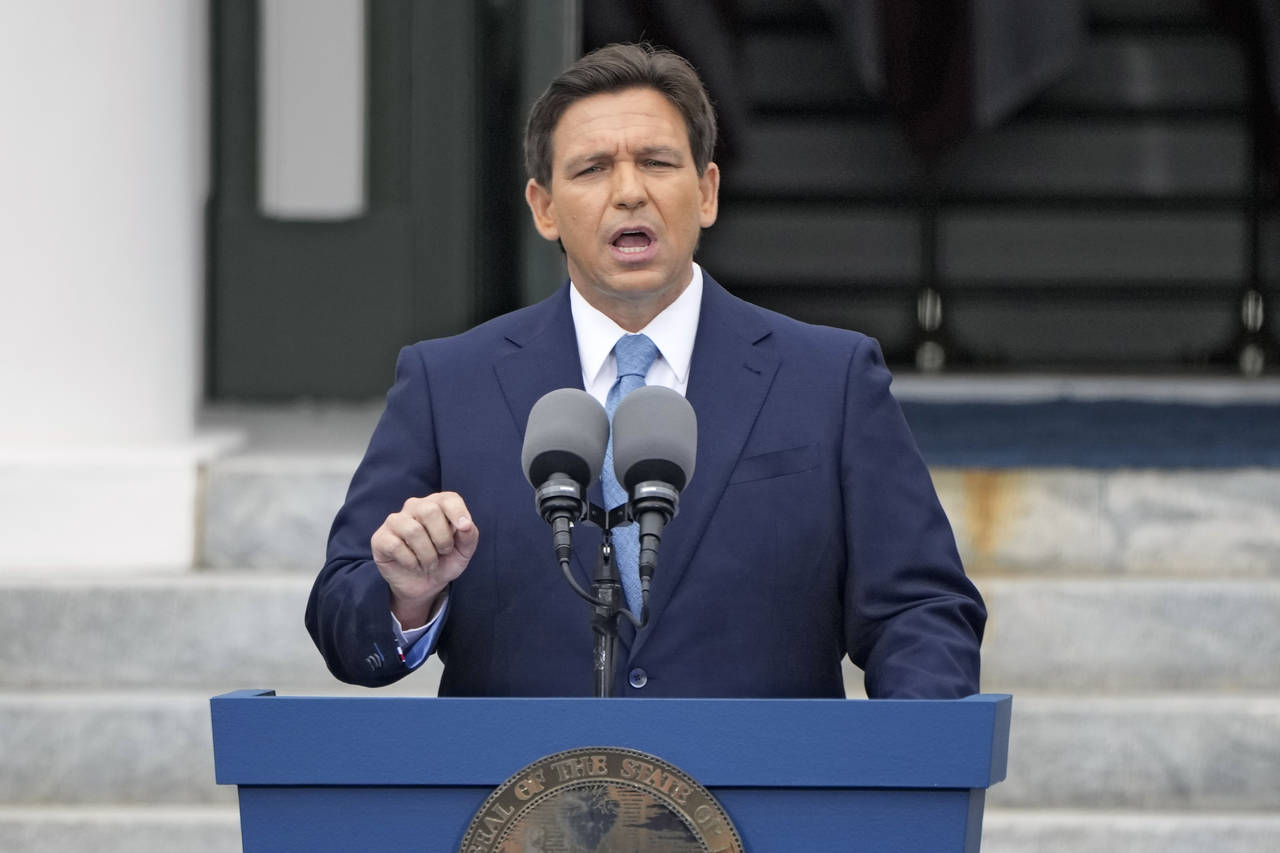 FILE - Florida Gov. Ron DeSantis speaks after being sworn in to begin his second term during an ina...