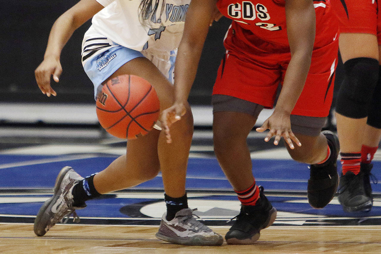 FILE - Two players vie for the ball during the first quarter of an FHSAA Class 4A state semifinal g...
