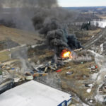
              This photo taken with a drone shows portions of a Norfolk Southern freight train that derailed Friday night in East Palestine, Ohio are still on fire at mid-day Saturday, Feb. 4, 2023. (AP Photo/Gene J. Puskar)
            