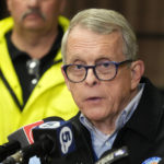 
              Ohio Gov. Mike DeWine meets with reporters after touring the Norfolk Southern train derailment site in East Palestine, Ohio, Monday, Feb. 6, 2023. (AP Photo/Gene J. Puskar)
            