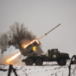 
              Ukrainian military fires from a multiple rocket launcher at Russian positions in the Kharkiv area, Ukraine, Saturday, Feb. 25, 2023. The Biden administration declared its Ukraine solidarity with fresh action as well as strong words on Friday, piling sweeping new sanctions on Moscow and approving a new $2 billion weapons package to re-arm Kyiv a year after Russia's invasion. (AP Photo/Vadim Ghirda)
            