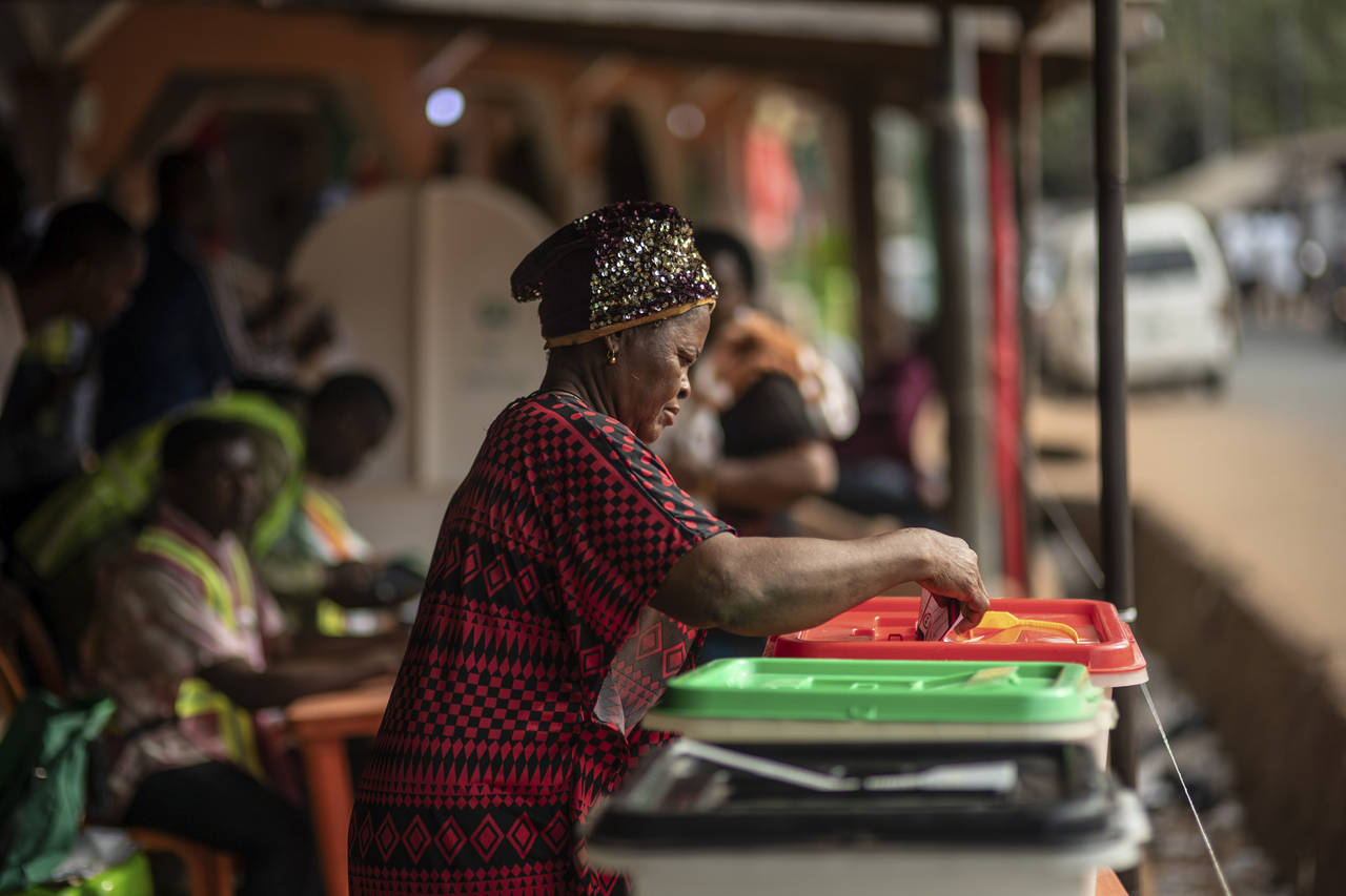 A woman casts her vote during the presidential elections in Agulu, Nigeria, Saturday, Feb. 25, 2023...