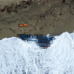 
              A view of part of the wreckage of a capsized boat that was washed ashore at a beach near Cutro, southern Italy, Monday, Feb. 27, 2023. Rescue crews searched by sea and air Monday for the dozens of people believed still missing from a shipwreck off Italy’s southern coast that drove home once again the desperate and dangerous crossings of migrants seeking to reach Europe. (AP Photo/Luigi Navarra)
            