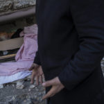 
              CORRECTS SPELLING OF FAMILY NAME - Zafer Mahmut Boncuk, 60, screams angrily next to the body of his dead mother, Ozcan Bencuk, in Antakya, southeastern Turkey, Saturday, February 11, 2023. Ozcan Boncuk, 75, was trapped during an earthquake that struck a border region of Turkey and Syria and died on Tuesday, a day later. (AP Photo/Bernat Armangue)
            