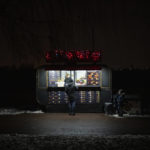 
              A man buys snacks at a kiosk in Kyiv, Ukraine, Tuesday, Jan. 31, 2023. (AP Photo/Daniel Cole)
            