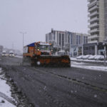 
              A snow plow clears a street in the Cholargos suburb of Athens during a snowstorm, Monday, Feb. 6, 2023. A cold snap sweeping across southern Greece has caused blackouts, highway closures, and service disruptions. Schools were closed in Athens, along with court houses and multiple services. (AP Photo/Thanassis Stavrakis)
            