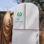 
              A woman fills her ballot in a booth before casting her vote during the presidential and parliamentary elections in Yola, Nigeria, Saturday, Feb. 25, 2023. Voters in Africa's most populous nation are heading to the polls Saturday to choose a new president, following the second and final term of incumbent Muhammadu Buhari. (AP Photo/Sunday Alamba)
            