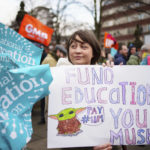 
              Striking teachers are seen at a demonstration in Manchester, England, Wednesday, Feb. 1, 2023. Thousands of schools in the U.K. are closing some or all of their classrooms, train services will be paralyzed and delays are expected at airports Wednesday in what’s shaping up to be the biggest day of industrial action Britain has seen in more than a decade, as unions step up pressure on the government to demand better pay amid a cost-of-living crisis.  (AP Photo/Jon Super)
            