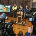 
              Ohio Governor Mike DeWine meets with reporters after touring the Norfolk Southern train derailment site in East Palestine, Ohio, Monday, Feb. 6, 2023. Authorities in Ohio say they plan to release toxic chemicals from five cars of a derailed train in Ohio to reduce the threat of an explosion. (AP Photo/Gene J. Puskar)
            
