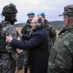 
              Russian President Vladimir Putin, center, speaks to a soldier as he visits a military training centre of the Western Military District for mobilized reservists in the Ryazan region of Russia, on Oct. 20, 2022. Defense Minister Sergei Shoigu is seen back to camera. Putin sent Russian forces into Ukraine on Feb. 24, 2022, and appears determined to prevail. (Mikhail Klimentyev, Sputnik, Kemlin Pool Photo via AP, File)
            