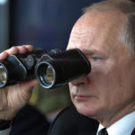 
              Russian President Vladimir Putin holds binoculars while watching military exercises Center-2019 at Donguz shooting range near Orenburg, Russia, on Sept. 20, 2019. Putin, whose forces invaded Ukraine on Feb. 24, 2022, appears determined to prevail -- ruthlessly and at all costs. (Alexei Nikolsky, Sputnik, Kremlin Pool Photo via AP, File)
            