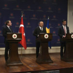 
              Turkey's Foreign Minister Mevlut Cavusoglu, centre, European Commissioner for Neighbourhood and Enlargement Oliver Varhelyi, left, and Sweden's Minister for International Development Cooperation and Foreign Trade Johan Forssell speak at a joint news conference in Ankara, Turkey, Wednesday, Feb. 22, 2023. Varhelyi and Forssell are in town to prepare for the International Donor's Conference, scheduled for March in Brussels, and aimed at mobilizing funds from the international community to support Turkey and Syria following the quakes.(AP Photo/Burhan Ozbilici)
            