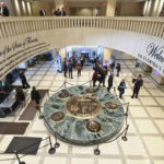
              The Florida Capitol rotunda is abuzz with people during the Special Session Wednesday, Feb. 8, 2023 in Tallahassee, Fla. (AP Photo/Phil Sears)
            
