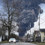 
              A black plume rises over East Palestine, Ohio, as a result of a controlled detonation of a portion of the derailed Norfolk and Southern trains Monday, Feb. 6, 2023. (AP Photo/Gene J. Puskar)
            