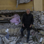 
              ADS NAMES - Zafer Mahmut Bencuk, 60, screams angrily next to the body of his dead mother, Ozcan Bencuk, in Antakya, southeastern Turkey, Saturday, February 11, 2023. Ozcan Bencuk, 75, was trapped during an earthquake that struck a border region of Turkey and Syria and died on Tuesday, a day later. (AP Photo/Bernat Armangue)
            