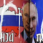 
              Coffee mugs with a pictures of Russian President Vladimir Putin on sale on the main pedestrian street in downtown Belgrade, Serbia, Monday, Jan. 16, 2023. Since the start of the war in Ukraine, about 200,000 Russians have left their homeland for Serbia, with many seeking a new life in a fraternal Slavic country free from Kremlin oppression. The Balkan country is a close ally of Moscow, with historic, religious and cultural ties, and Russia backs Serbia’s claim over its former province of Kosovo. (AP Photo/Darko Vojinovic)
            