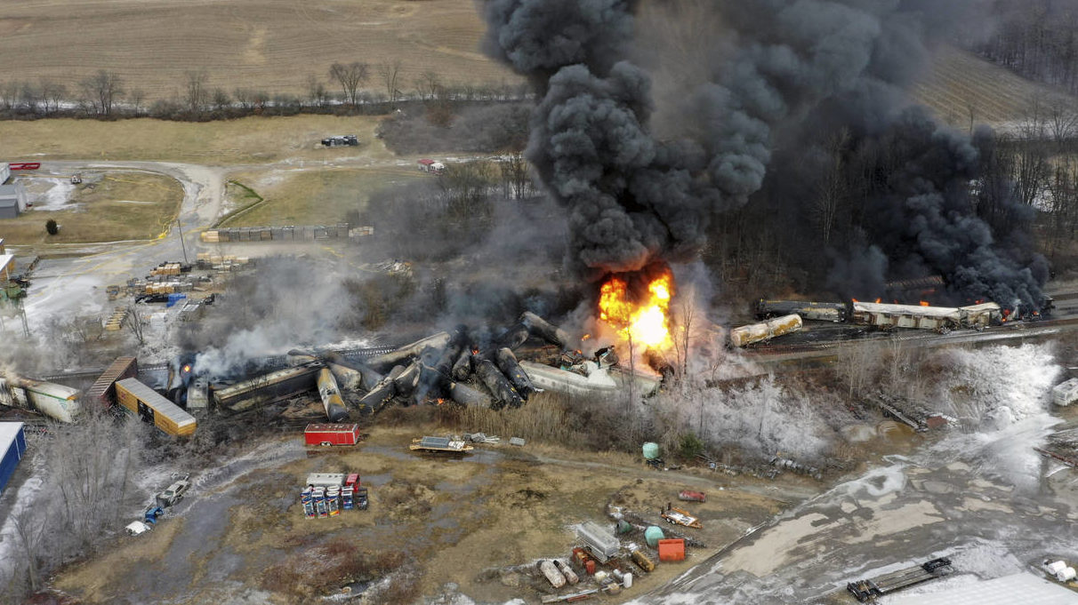 This photo taken with a drone shows portions of a Norfolk and Southern freight train that derailed ...