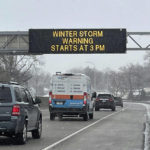 
              Vehicles pass a sign that reads "WINTER STORM WARNING STARTS AT 3PM" along Interstate Highway 35 near the Minneapolis-Saint Paul International Airport in Minn., on Feb. 21, 2023, ahead of a winter storm that took aim at the Upper Midwest. The storm threatened to bring blizzard conditions, bitterly cold temperatures and 2 feet of snow in a three-day onslaught that could affect more than 40 million Americans. (AP Photo/Trisha Ahmed)
            