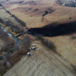
              FILE - In this photo taken by a drone, cleanup continues in the area where the ruptured Keystone pipeline dumped oil into a creek in Washington County, Kan., on Dec. 9, 2022. A faulty weld at a bend in an oil pipeline contributed to a spill that dumped nearly 13,000 bathtubs' worth of crude oil into a northeastern Kansas creek, the pipeline's operator said Thursday, Feb. 9, 2023, estimating the cost of cleaning it up at $480 million. (DroneBase via AP, File)
            