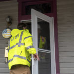 
              EPA officials knock on doors and talk to residents in East Palestine, Ohio, Thursday, Feb. 16, 2023. Residents of the Ohio village upended by a freight train derailment are demanding to know if they're safe from the toxic chemicals that spilled or were burned off to avoid an even bigger disaster. (Lucy Schaly/Pittsburgh Post-Gazette via AP)
            