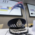 
              The peaked cap of David McLean, Australia's Federal Police, sits on the table prior to the Joint Investigation Team (JIT) news conference at the Eurojust building in The Hague, Netherlands, Wednesday, Feb. 8, 2023, on the results of the ongoing investigation into other parties involved in the downing of flight MH17 on 17 July 2014. The JIT investigated the crew of the Buk-TELAR, a Russian made rocket launcher, and those responsible for supplying this Russian weapon system that downed MH17. (AP Photo/Peter Dejong)
            