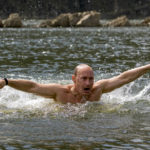 
              Then-Russian Prime Minister Vladimir Putin swims while in the Siberian region of Tuva during a vacation on Monday, Aug. 3, 2009. Putin sent Russian forces into Ukraine on Feb. 24, 2022, and appears determined to prevail -- ruthlessly and at all costs. (Alexei Druzhinin, Sputnik, Kremlin Pool Photo via AP, File)
            