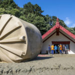 
              A large water tank lies beside a Maori meeting house at Tangoio Marae following Cyclone Gabrielle in the Hawkes Bay of New Zealand, Sunday, Feb. 19, 2023. Cyclone Gabrielle struck the country's north on Feb. 13 and the level of damage has been compared to Cyclone Bola in 1988. That storm was the most destructive on record to hit the nation of 5 million people. (Paul Taylor/Hawkes Bay Today via AP)
            