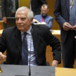 
              European Union foreign policy chief Josep Borrell rings a bell to signify the start of a meeting of EU foreign ministers at the European Council building in Brussels on Monday, Feb. 20, 2023. European Union foreign ministers meet Monday to discuss Ukraine, Afghanistan and the situation in Iran. (AP Photo/Virginia Mayo)
            