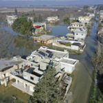 
              An aerial view of the al-Tlul village flooded after a devastating earthquake destroyed a river dam in the town of Salqeen near the Turkish border, Idlib province, Syria, Thursday, Feb. 9, 2023.   (AP Photo/Ghaith Alsayed)
            