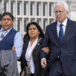 
              Attorney Eric Schnapper, right, walks with Beatriz Gonzalez, second from right, the mother of 23-year-old Nohemi Gonzalez, a student killed in the Paris terrorist attacks, and stepfather Jose Hernandez, outside the Supreme Court,Tuesday, Feb. 21, 2023, in Washington. A lawsuit against YouTube from the family of Nohemi Gonzalez was argued at the Supreme Court. (AP Photo/Alex Brandon)
            