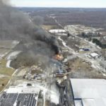 
              This photo taken with a drone shows portions of a Norfolk and Southern freight train that derailed Friday night in East Palestine, Ohio are still on fire at mid-day Saturday, Feb. 4, 2023. (AP Photo/Gene J. Puskar)
            