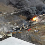 
              This photo taken with a drone shows portions of a Norfolk and Southern freight train that derailed Friday night in East Palestine, Ohio are still on fire at mid-day Saturday, Feb. 4, 2023. (AP Photo/Gene J. Puskar)
            