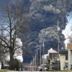
              A black plume rises over East Palestine, Ohio, as a result of the controlled detonation of a portion of the derailed Norfolk Southern trains Monday, Feb. 6, 2023. (AP Photo/Gene J. Puskar)
            