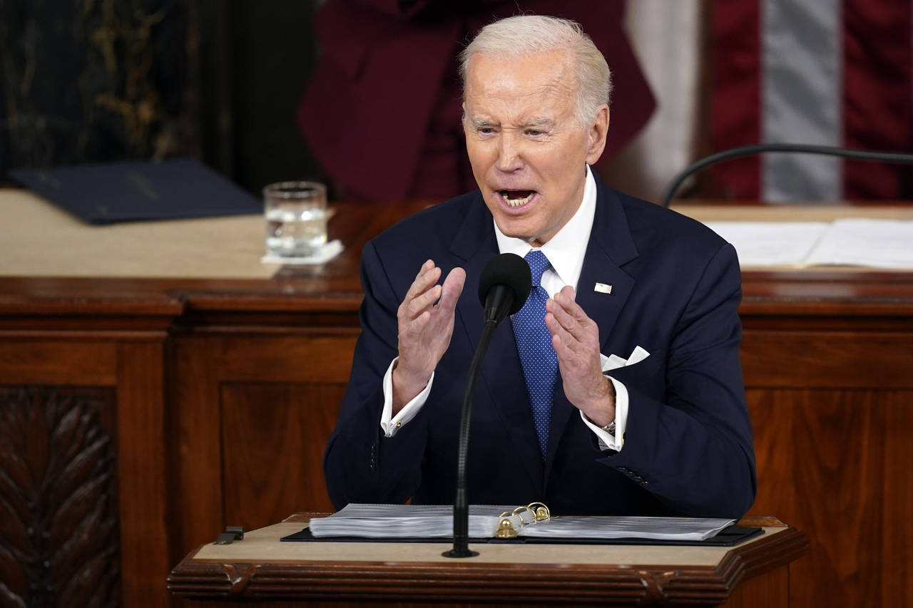 FILE - President Joe Biden delivers the State of the Union address to a joint session of Congress a...