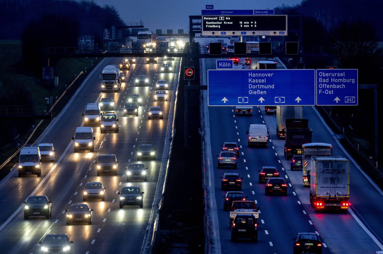 FILE - Cars and trucks drive on a highway in Frankfurt, Germany, Jan. 27, 2023. European Union gove...
