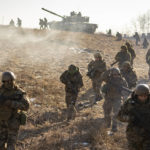 
              FILE - Ukrainian servicemen of the 3rd Separate Tank Iron Brigade take part in a drill, not far from the frontlines, in the Kharkiv area, Ukraine, Thursday, Feb. 23, 2023. Grueling artillery battles have stepped up in recent weeks in the vicinity of Kupiansk, a strategic town on the eastern edge of Kharkiv province by the banks of the Oskil River as Russian attacks intensifying in a push to capture the entire industrial heartland known as the Donbas, which includes the Donetsk and the Luhansk provinces. (AP Photo/Vadim Ghirda, File)
            