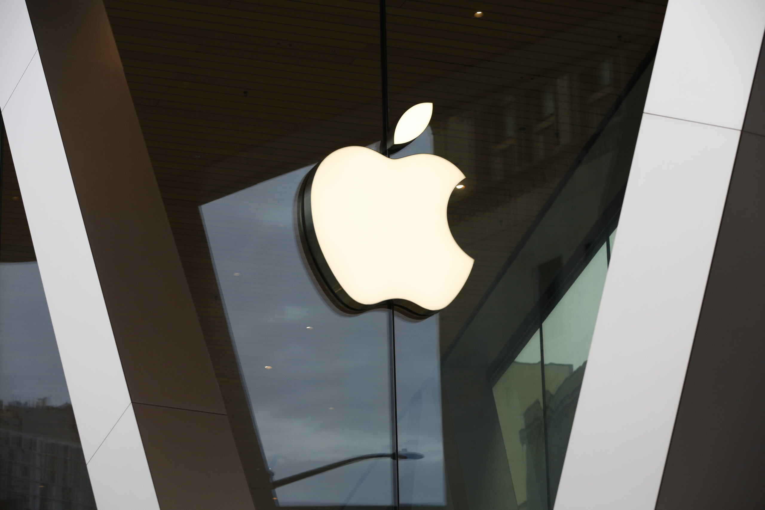 FILE - An Apple logo adorns the facade of the downtown Brooklyn Apple store on March 14, 2020, in N...