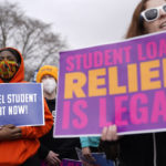
              Student debt relief advocates gather outside the Supreme Court on Capitol Hill in Washington, Tuesday, Feb. 28, 2023, as the court hears arguments over President Joe Biden's student debt relief plan. (AP Photo/Patrick Semansky)
            