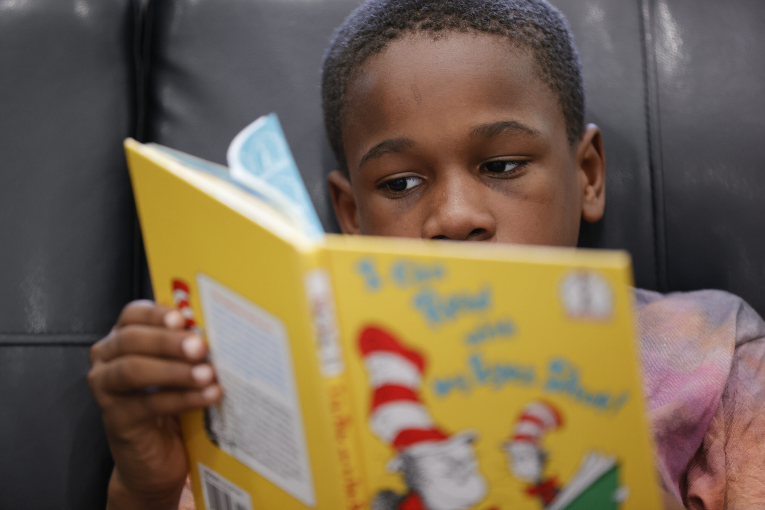 Michael Crowder, 11, reads during an after-school literacy program in Atlanta on Thursday, April 6,...