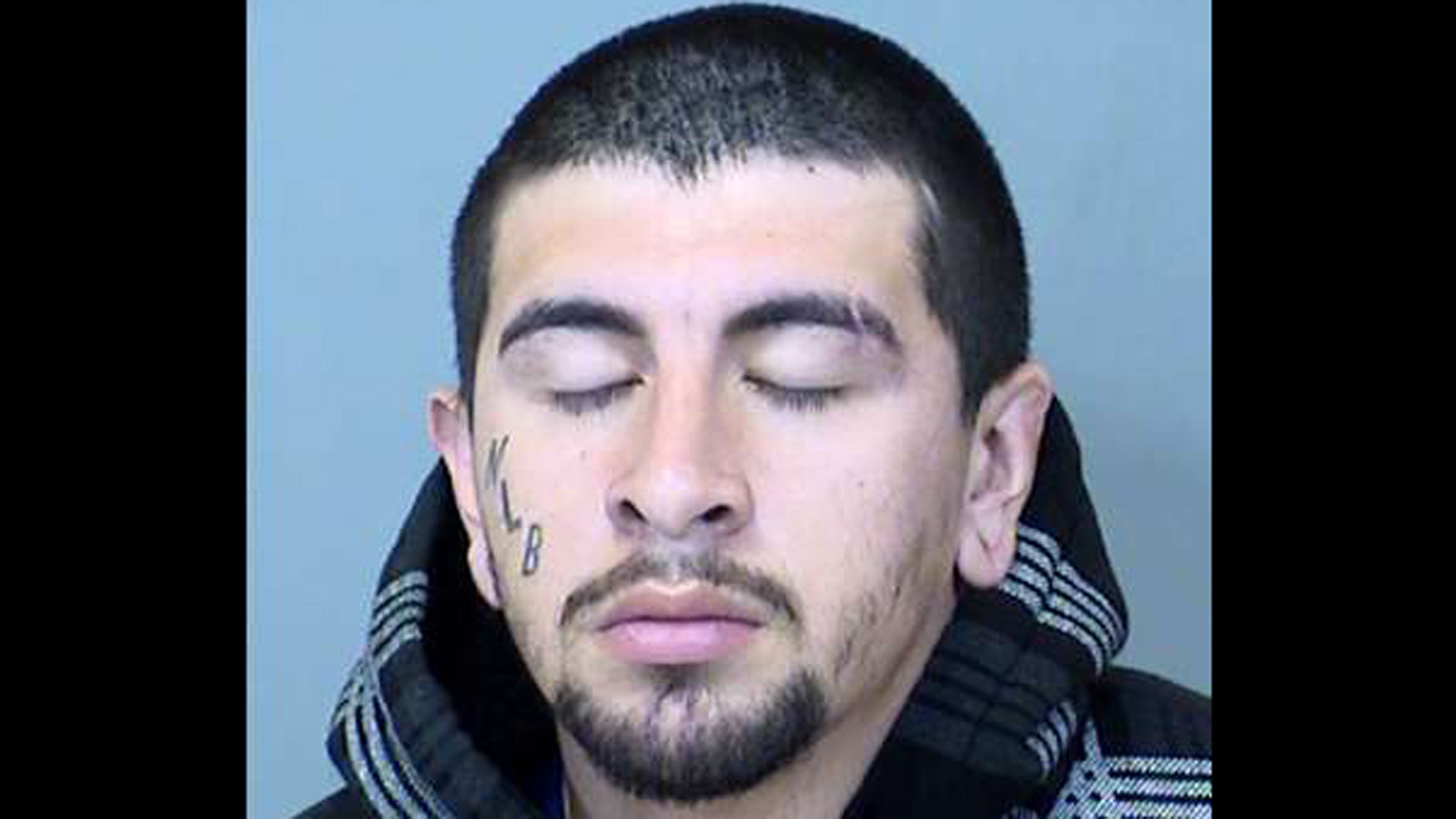 Booking photo of Alexander Martin Reyes, suspect in murder of Matthew Ballesteros in Phoenix, Arizo...