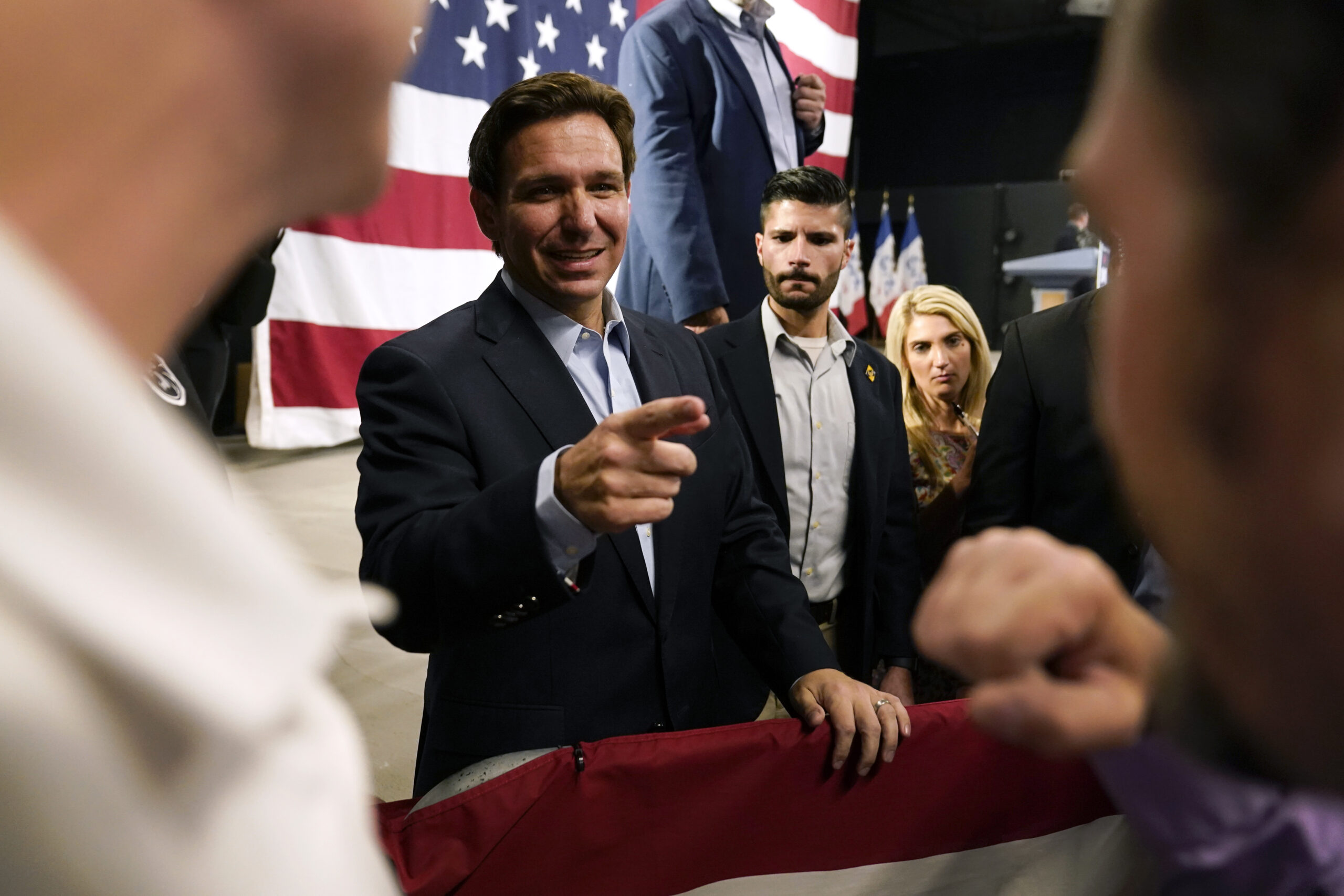 Republican presidential candidate Florida Gov. Ron DeSantis greets audience members during a campai...