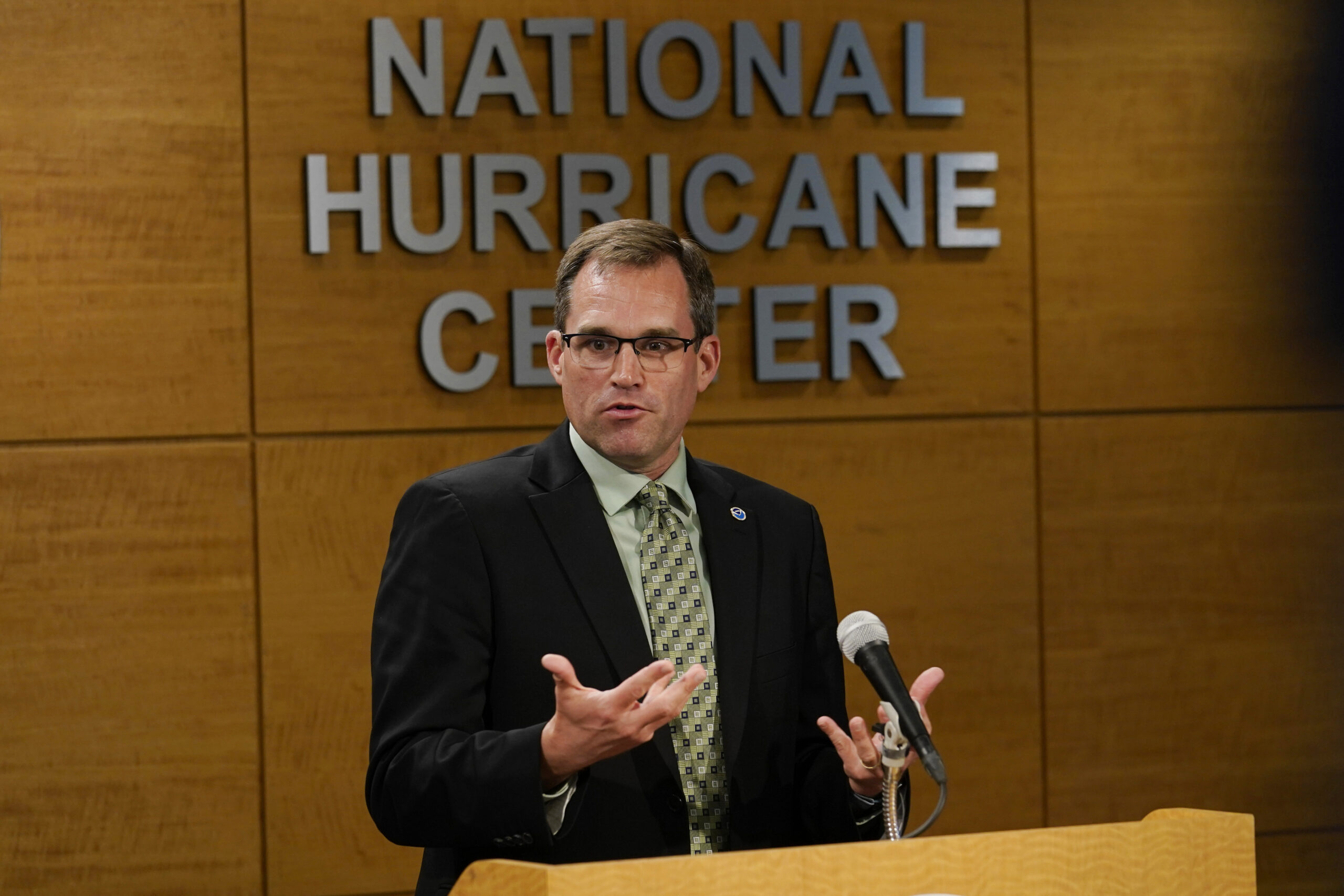 Mike Brennan, Director of the National Hurricane Center, speaks during a news conference, Wednesday...