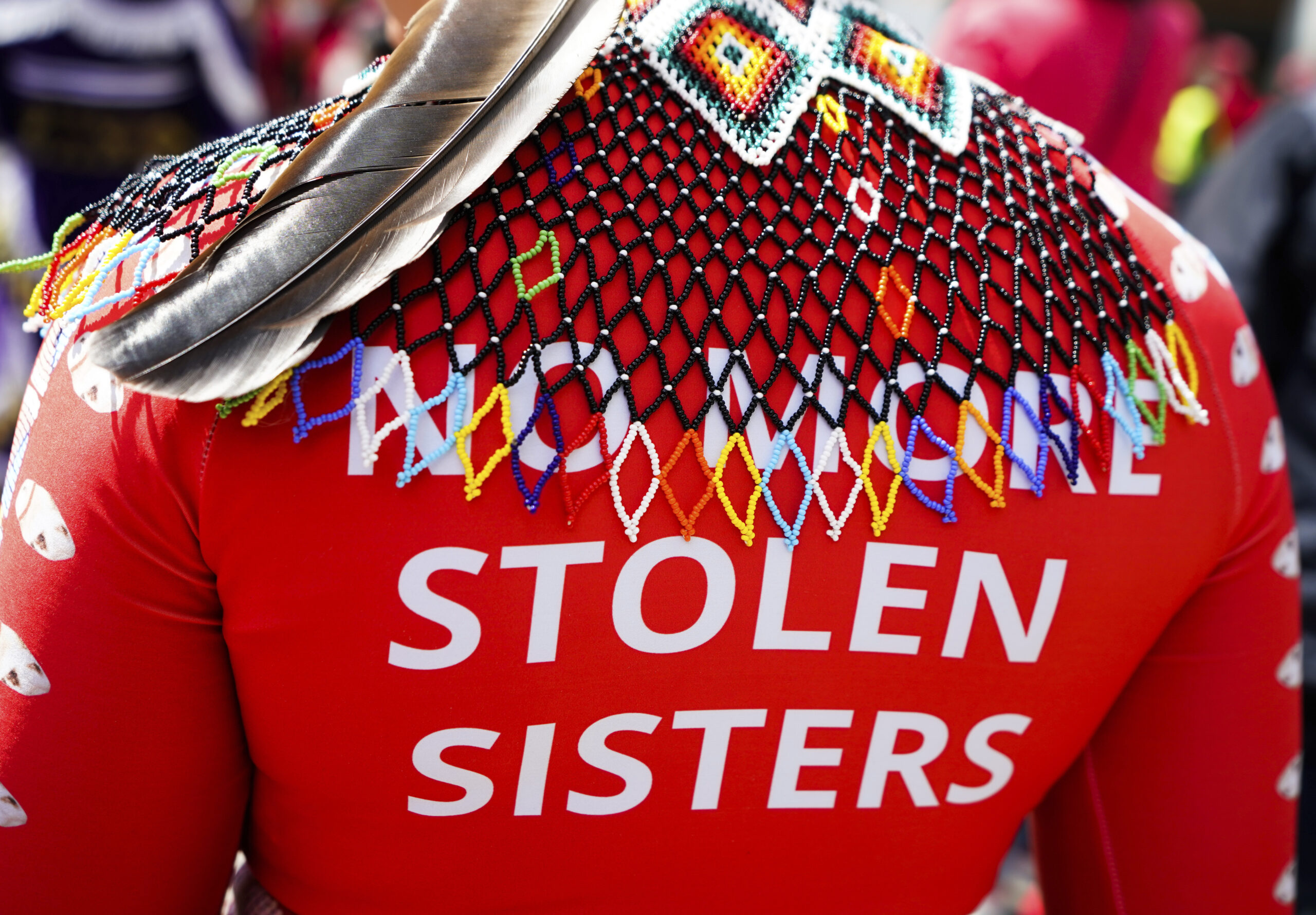 A marcher wears a shirt reading "No more stolen sisters" during the third annual march and gatherin...