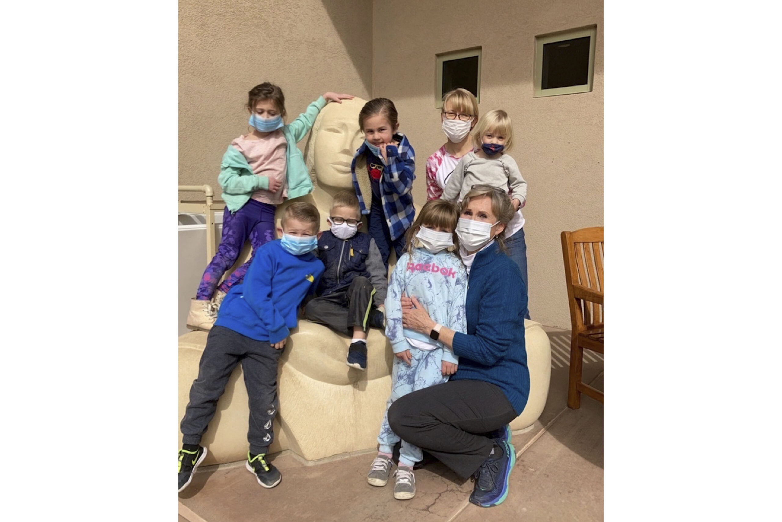 Longtime Farmington, N.M., preschool teacher Melody Ivie, far right, poses with some of her student...