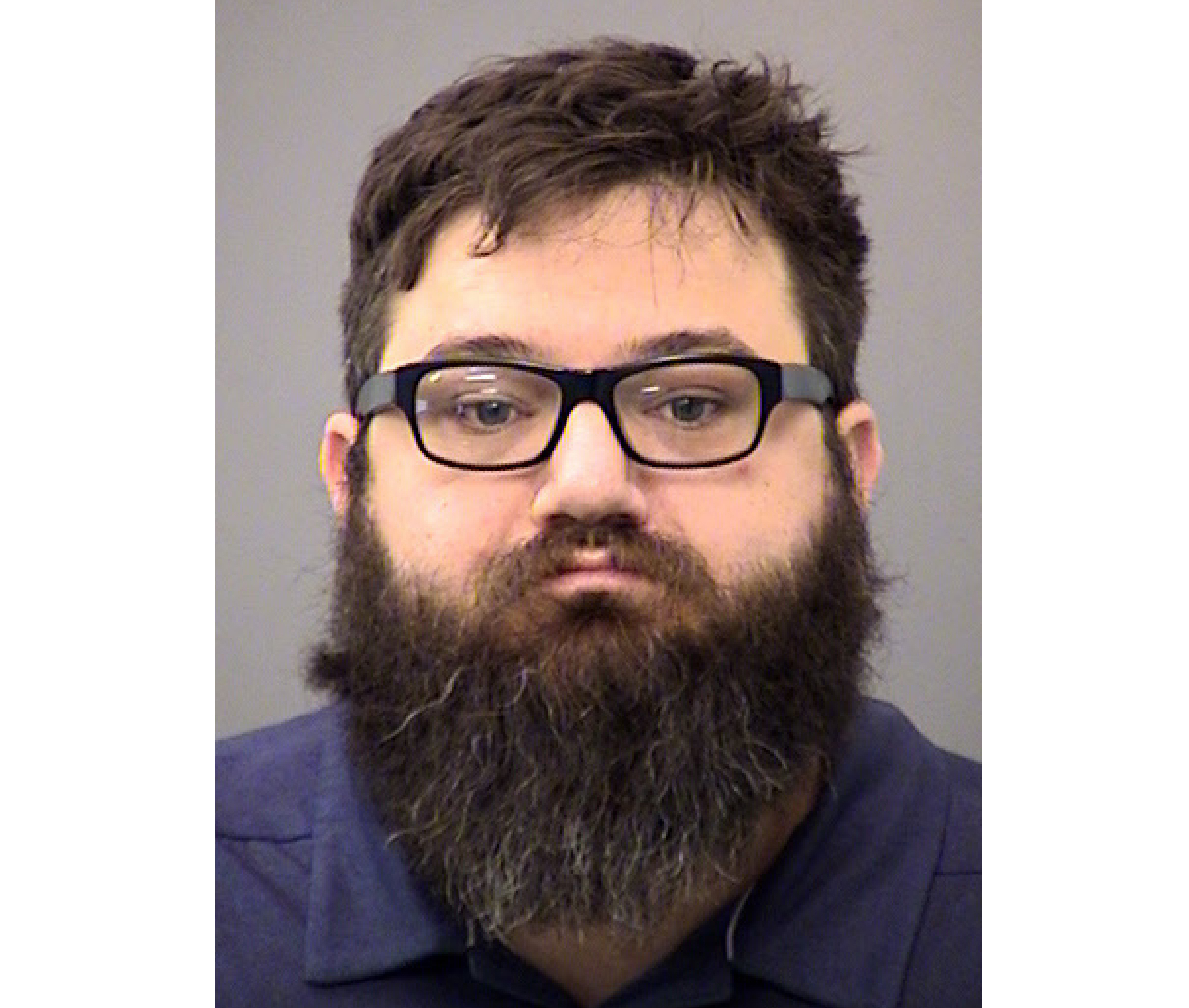 FILE - This booking photo provided by the Indianapolis Metropolitan Police Department shows Dustin ...