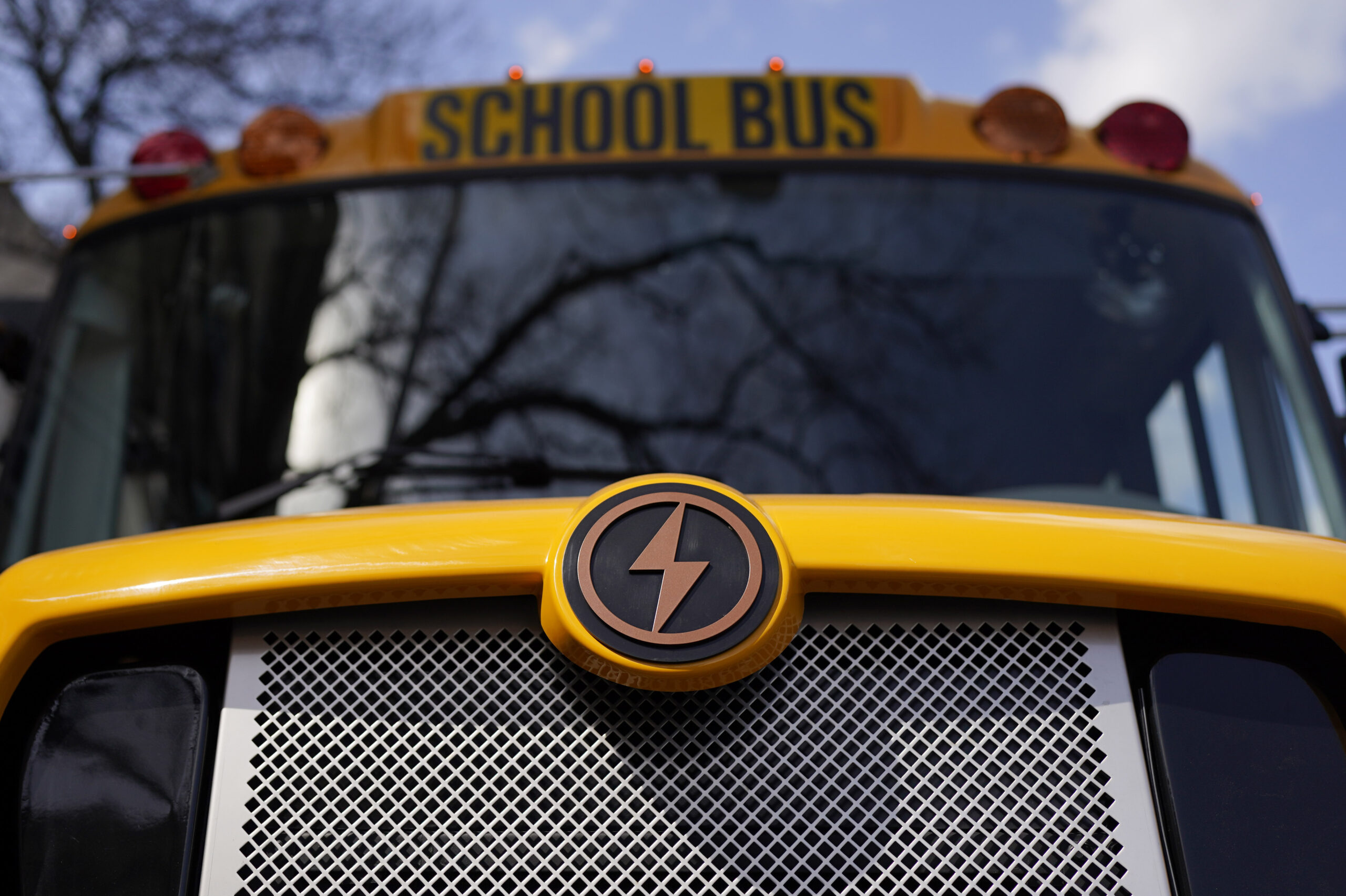 FILE - A Lion electric school bus is seen on display in Austin, Texas, Feb. 22, 2023. The Transport...